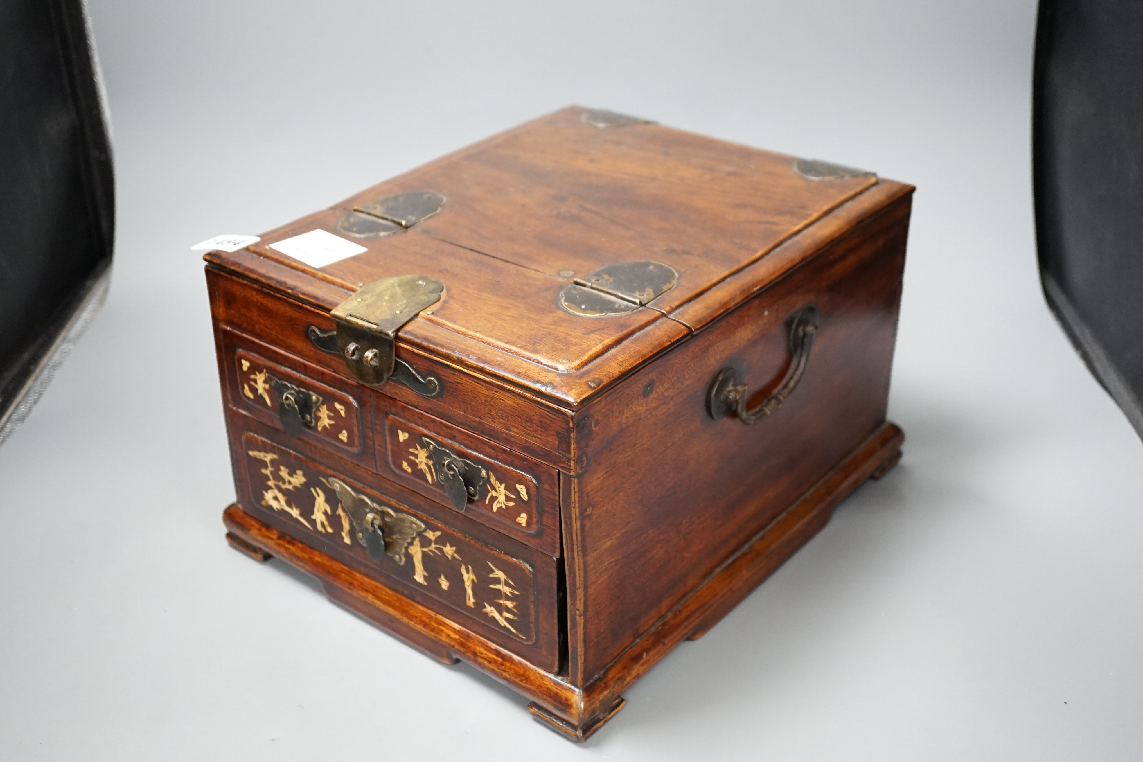 A late 19th century Chinese hardwood and bone inlaid jewellery box. 18.5cm tall
